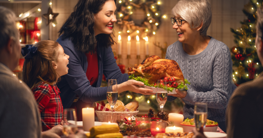 Family around Dinner Table celebrating Holiday